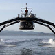 Illustration for article titled Proteus: Spider-Like Go-Fast Boat Zips Around the Bay in Dazzling Demo